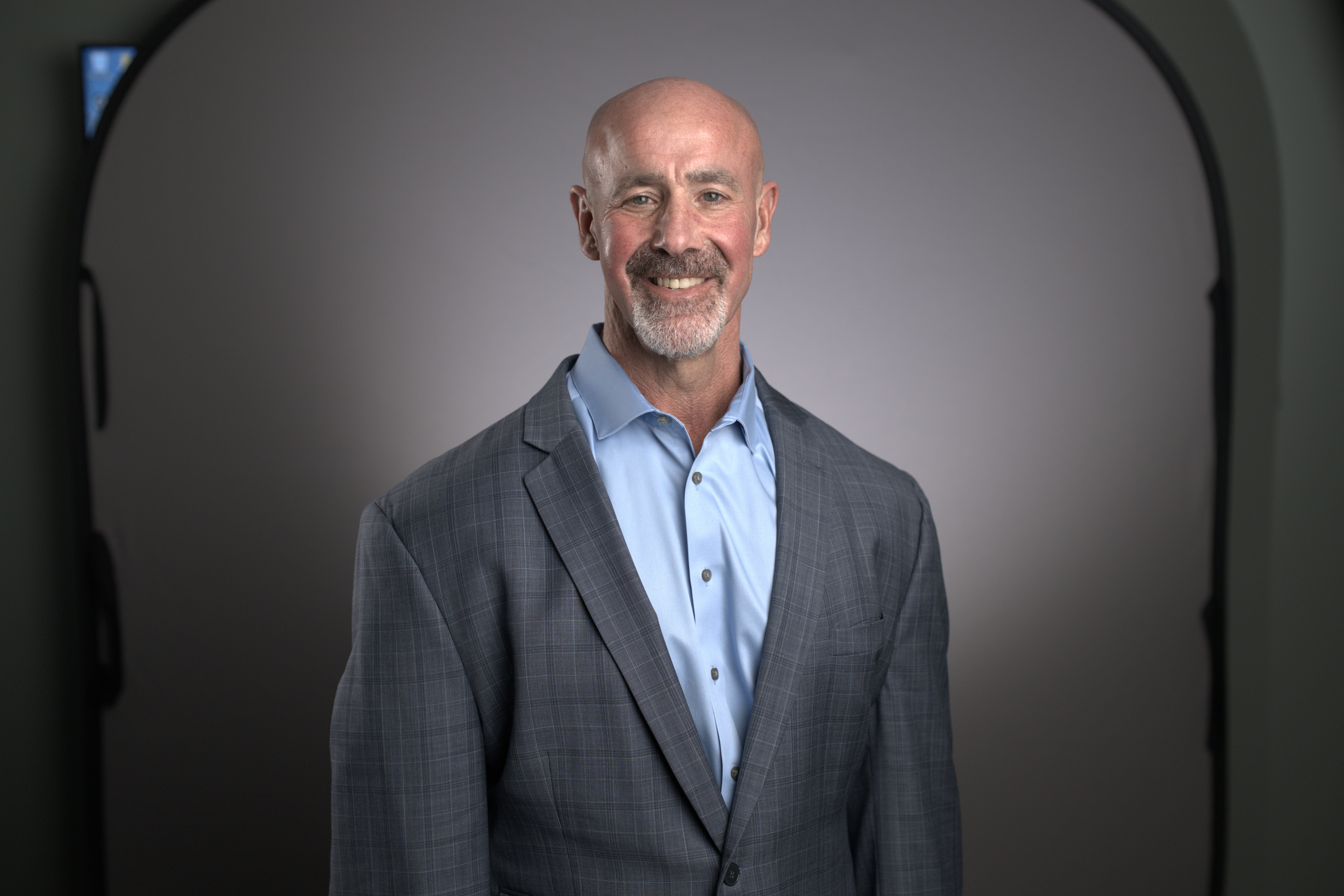 Dr. Robert K. Wesley is happily smiling