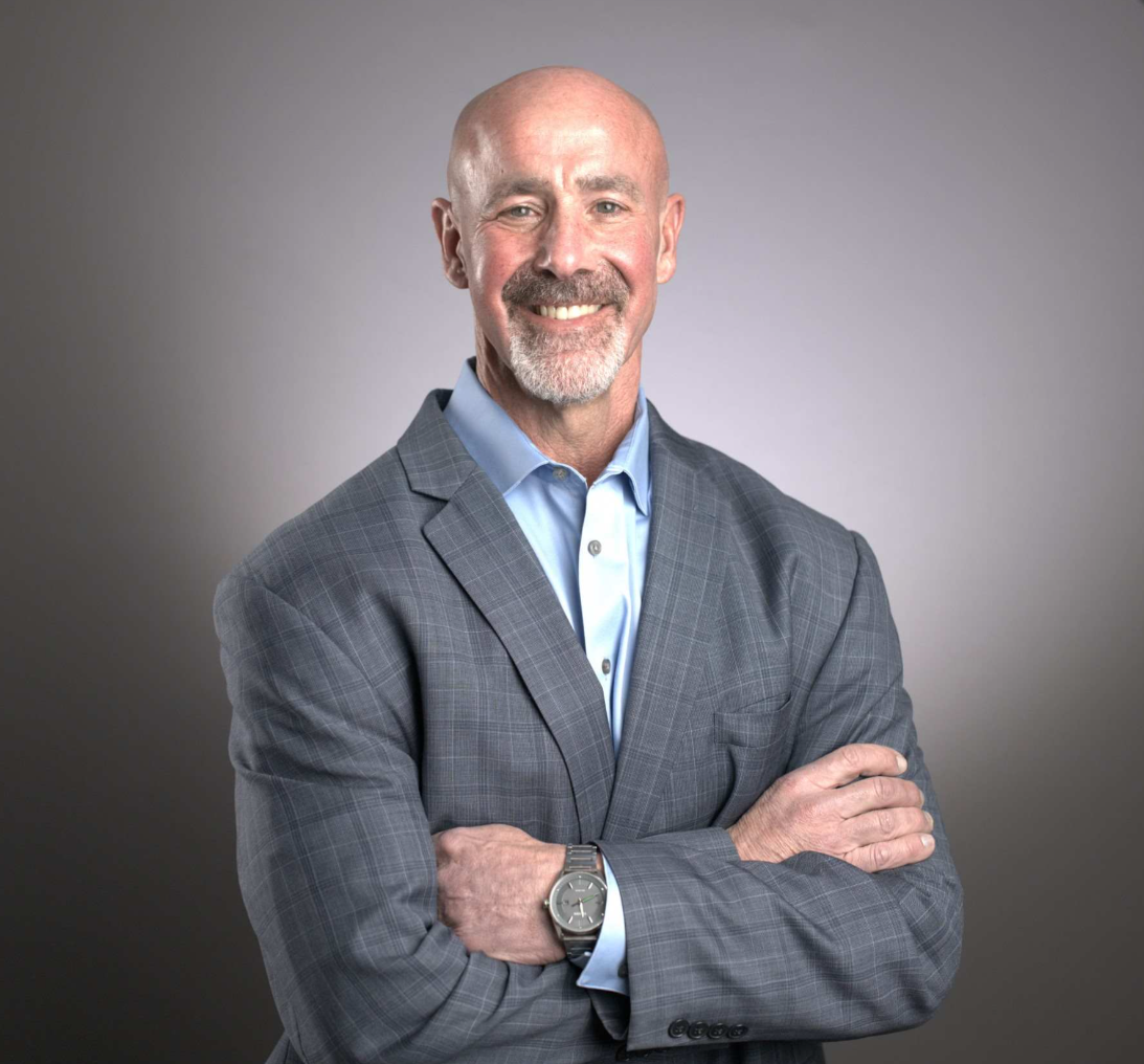 Dr. Robert K. Wesley is happily smiling